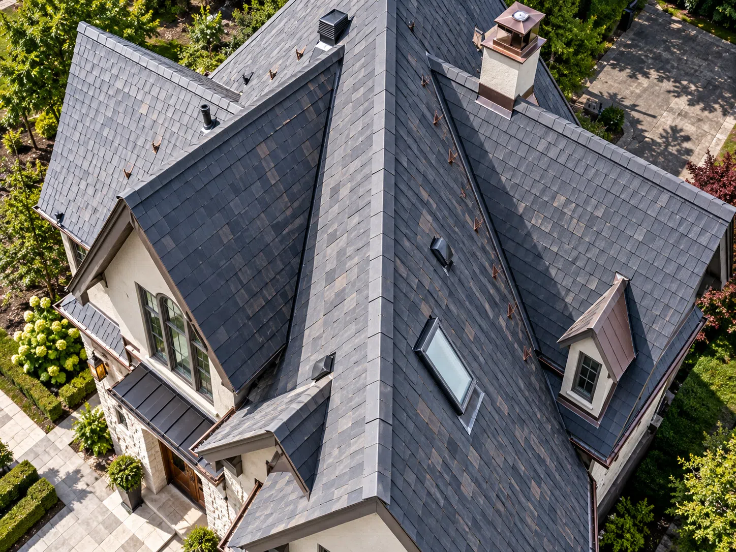 Aerial view of a steep multi-slope residential roof